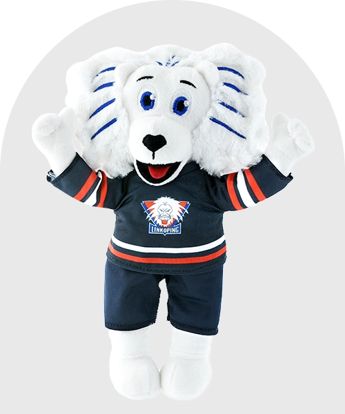 Mjukdjuret lejonet Sture med en blå, röd och vit dräkt